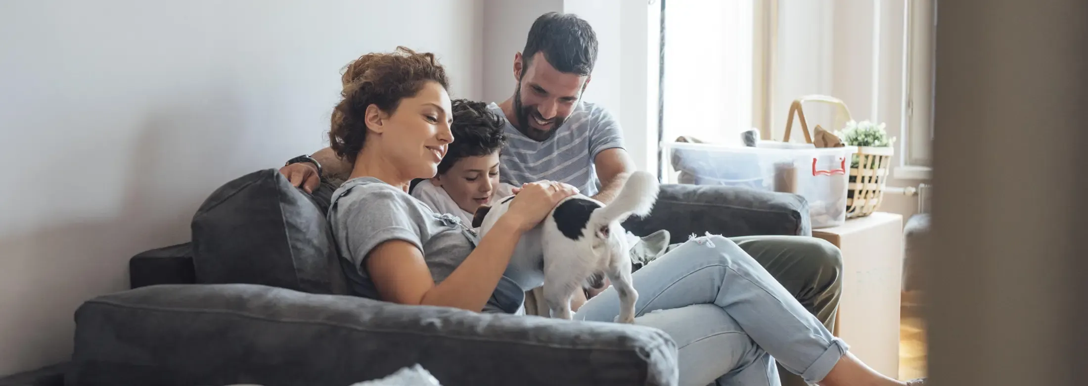 family playing with dog in a pest free home